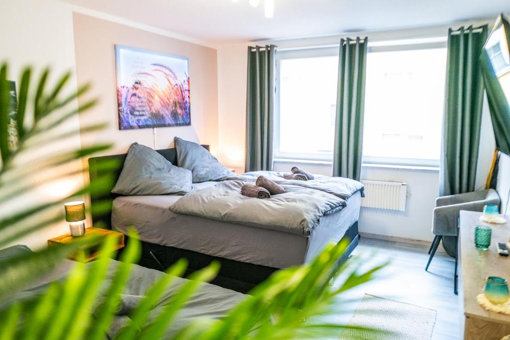 Postel nebo postele na pokoji v ubytování #611 Stilvolle und komfortable Wohnung in Essen
