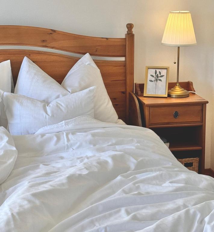 Postel nebo postele na pokoji v ubytování Villa Maier