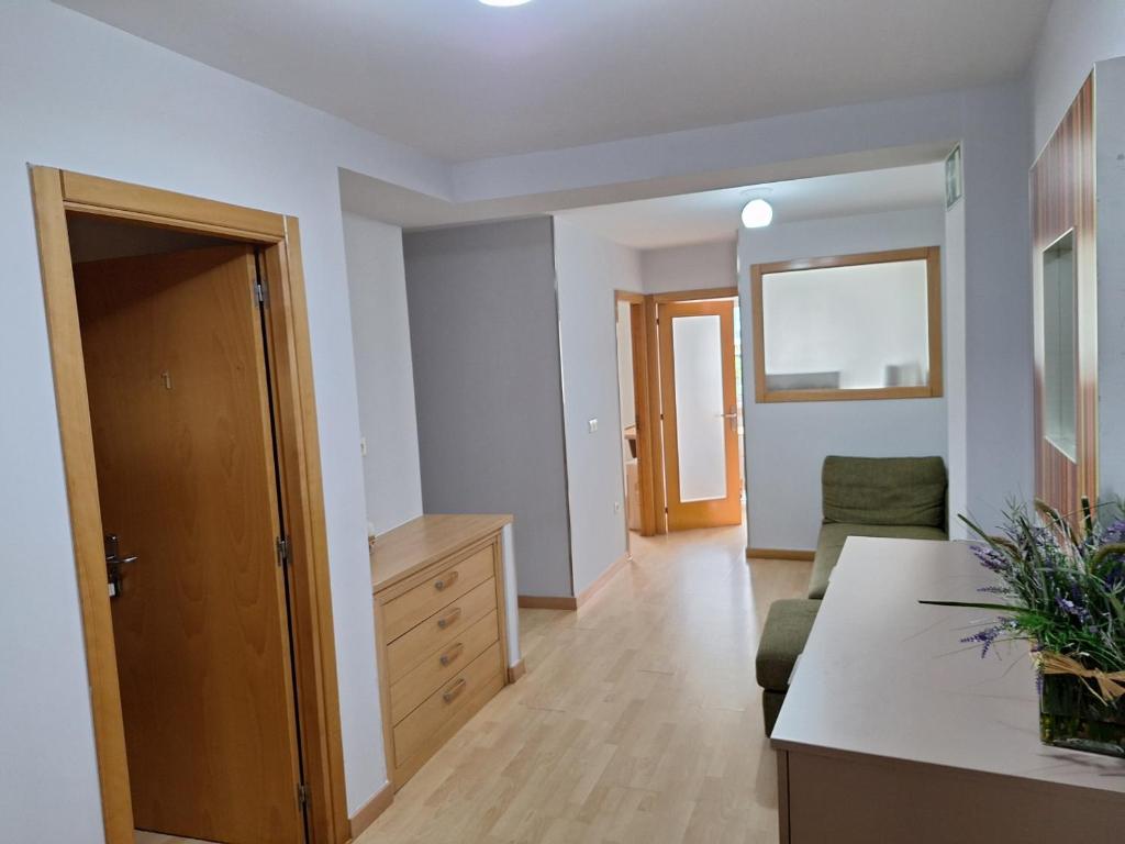Een bed of bedden in een kamer bij PR Blanco