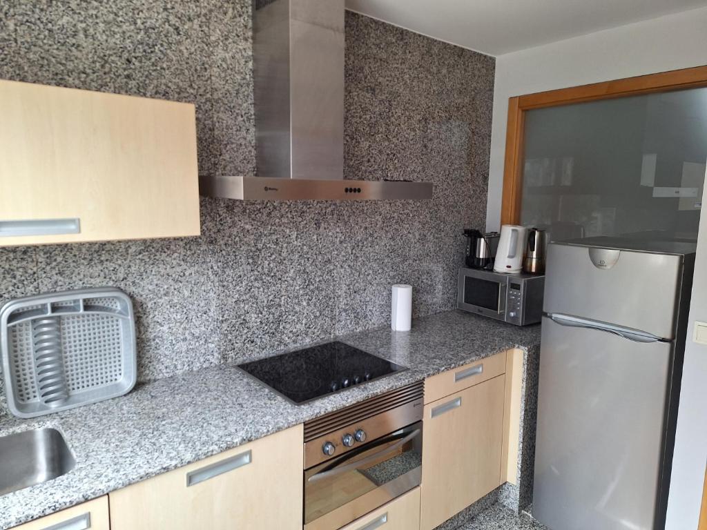 Een keuken of kitchenette bij PR Blanco