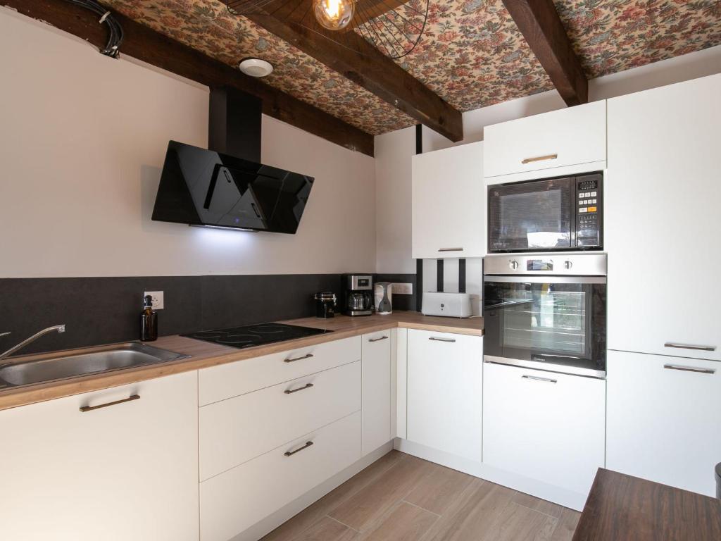 Kuchyňa alebo kuchynka v ubytovaní Holiday Home Ty Lez by Interhome
