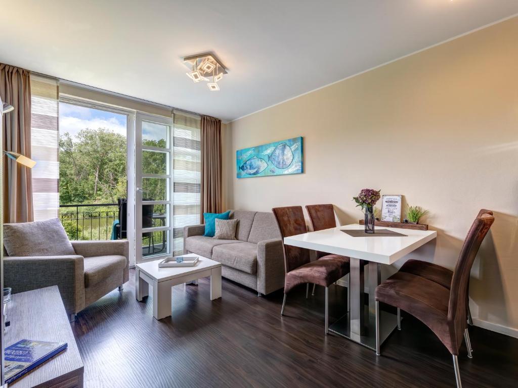 Posezení v ubytování Residenz am Balmer See - BS 53 mit Wellnessbereich