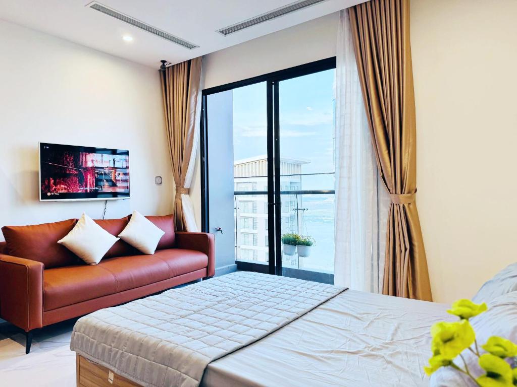 Katil atau katil-katil dalam bilik di Studio Beverly ban công view sông cao cấp