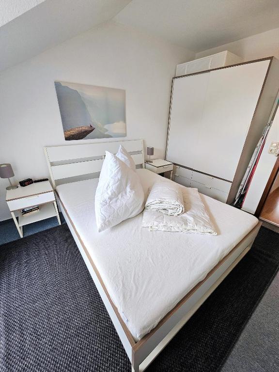 Postel nebo postele na pokoji v ubytování Ferienwohnung Riedel "Grüntal 25 - C 7"