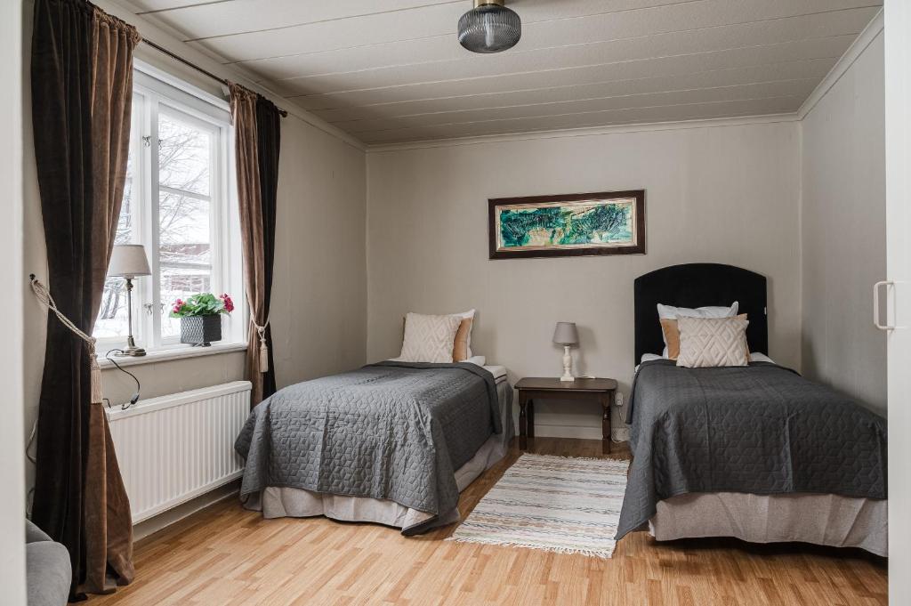 Postel nebo postele na pokoji v ubytování Gasabäck Holiday Accomondation