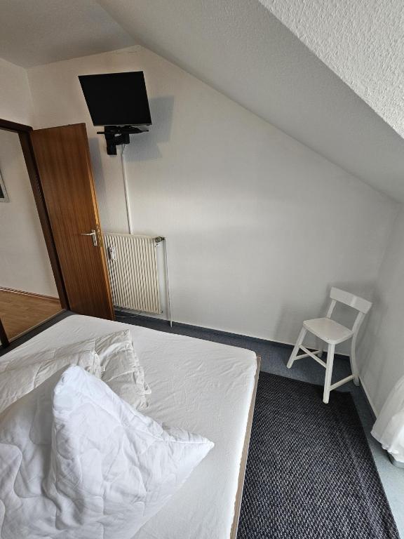 Postel nebo postele na pokoji v ubytování Ferienwohnung Riedel "Grüntal 25 - C 7"