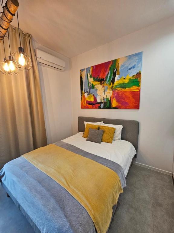 Łóżko lub łóżka w pokoju w obiekcie Ottimo Apartamenty Jagiellońska