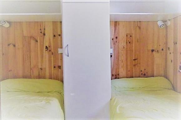 Postel nebo postele na pokoji v ubytování CAMPING PLEIN SOLEIL