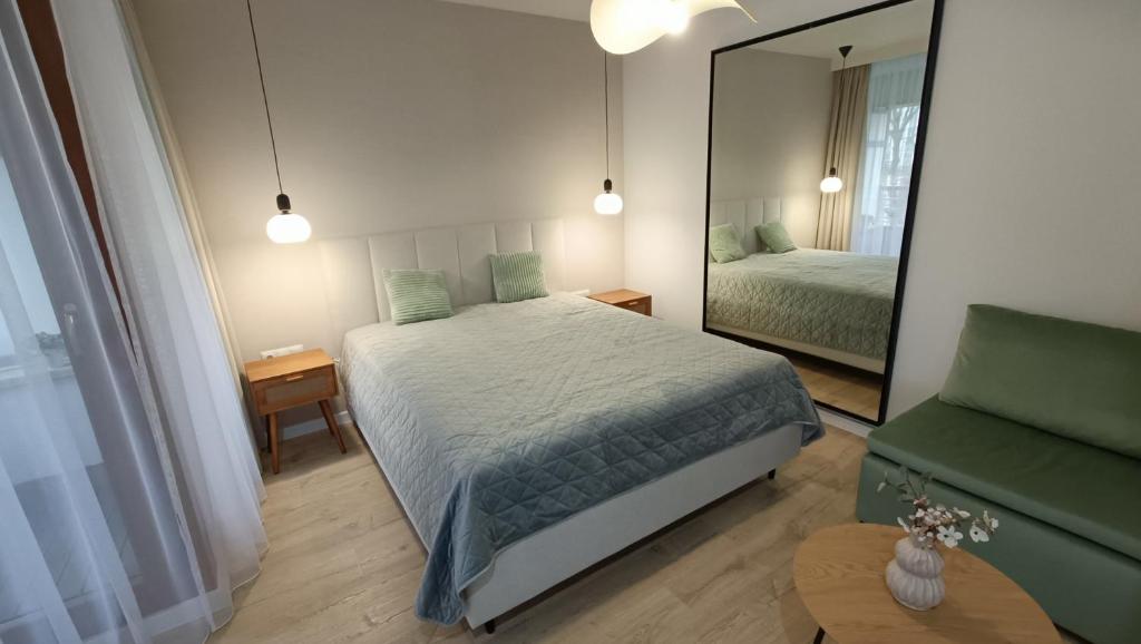 Posteľ alebo postele v izbe v ubytovaní 120 w 5 gwiazdowym ROYAL TULIP SAND 200 m od plaży DOBRUK APARTAMENTY