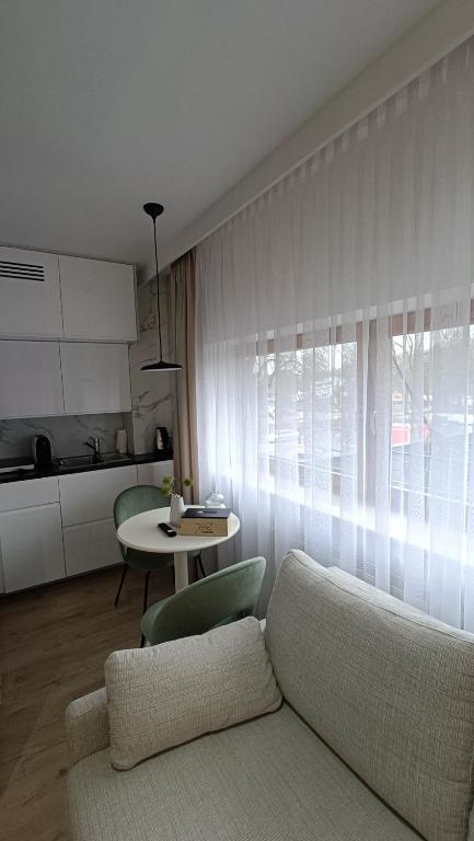 Kuchyňa alebo kuchynka v ubytovaní 120 w 5 gwiazdowym ROYAL TULIP SAND 200 m od plaży DOBRUK APARTAMENTY