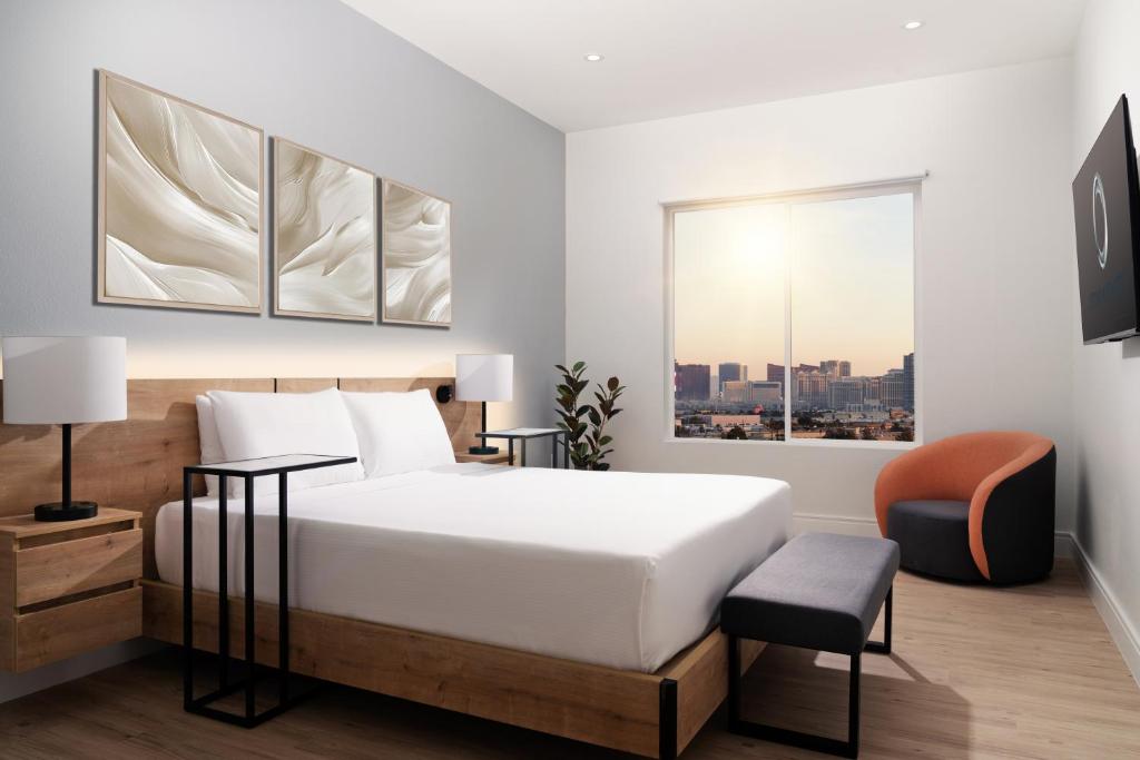 Ein Bett oder Betten in einem Zimmer der Unterkunft Otonomus Hotel Las Vegas