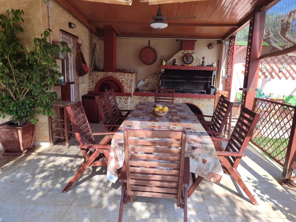 A patio or other outdoor area at George's family friendly maisonette with great exterior