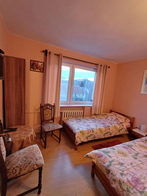 Posteľ alebo postele v izbe v ubytovaní Agroturystyka Brzozowe Wzgórze