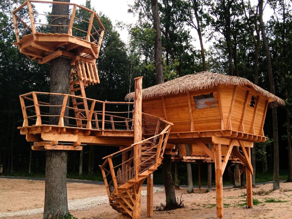 a tree house sitting on top of a tree at Holiday Home Treehouse 2 by Interhome in Hradec Králové