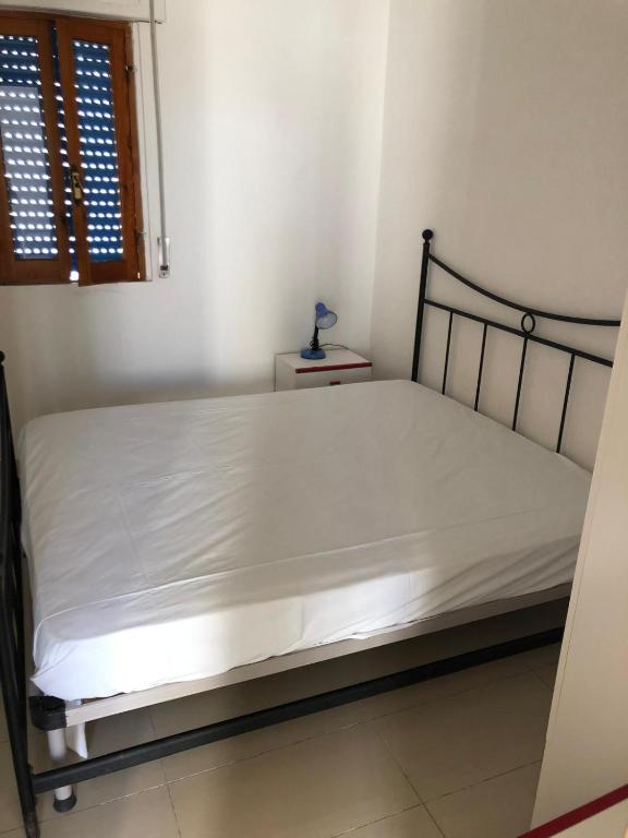 A bed or beds in a room at Dependence Valle Clavia