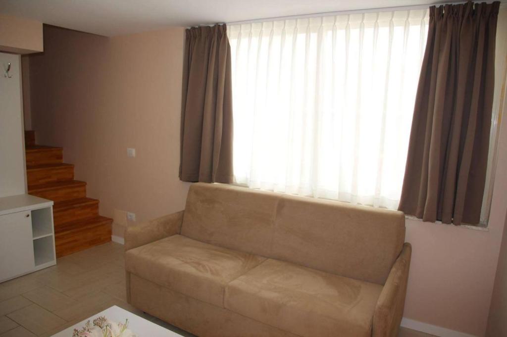 Posezení v ubytování Pampas Duplex Rooms