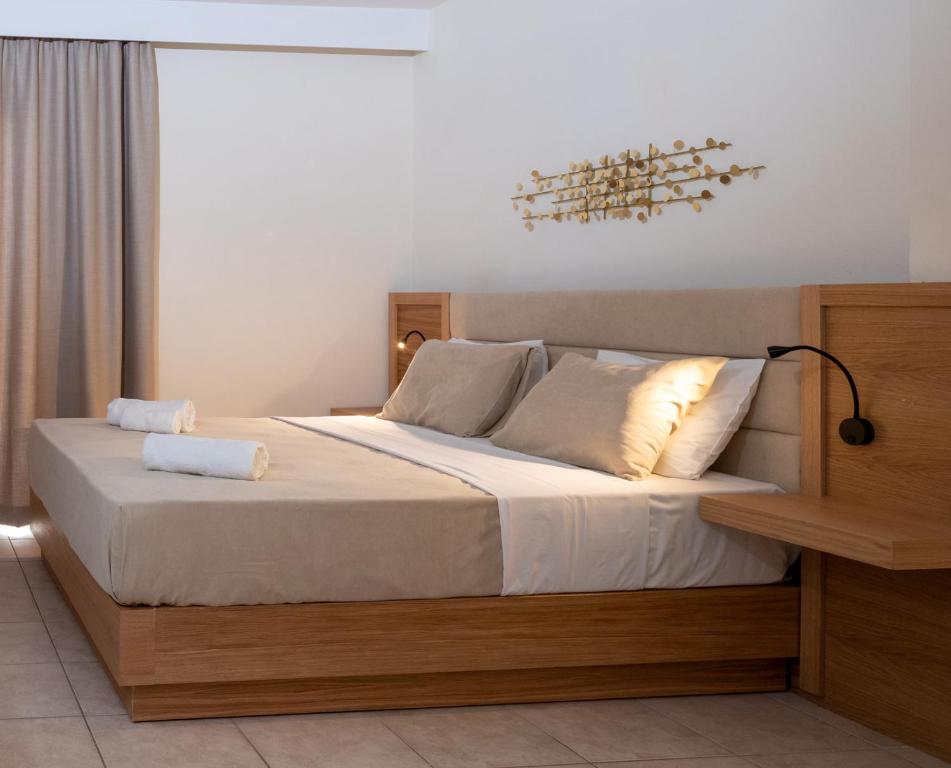 Postel nebo postele na pokoji v ubytování Calypso Hotel
