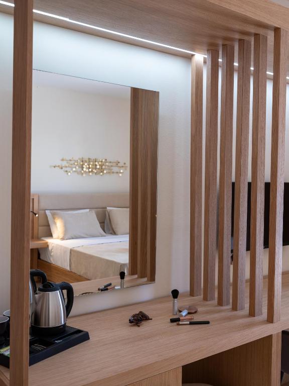 Postel nebo postele na pokoji v ubytování Calypso Hotel