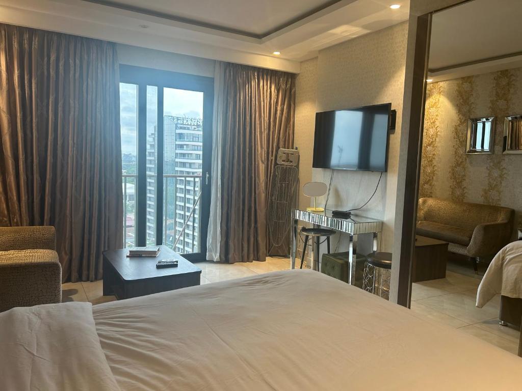 Ένα ή περισσότερα κρεβάτια σε δωμάτιο στο Studio,atMirage