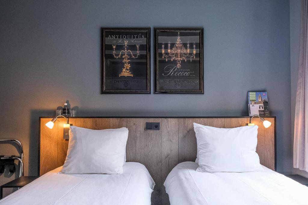 Postel nebo postele na pokoji v ubytování B&B 't Poorthuys