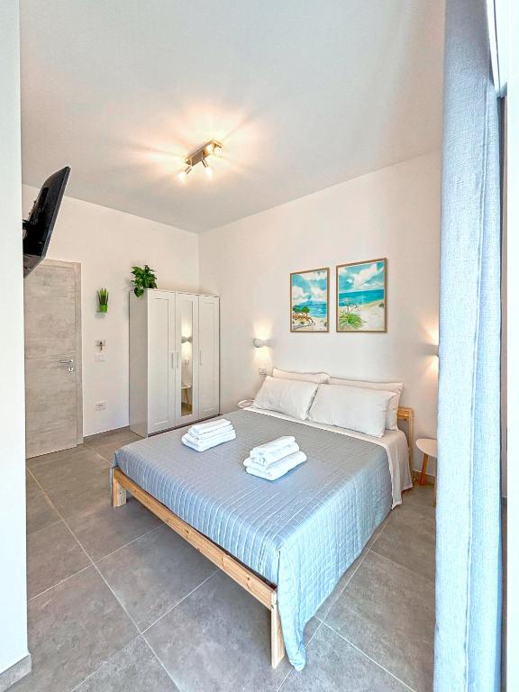 Postel nebo postele na pokoji v ubytování NEMO BnB ALGHERO CENTRE