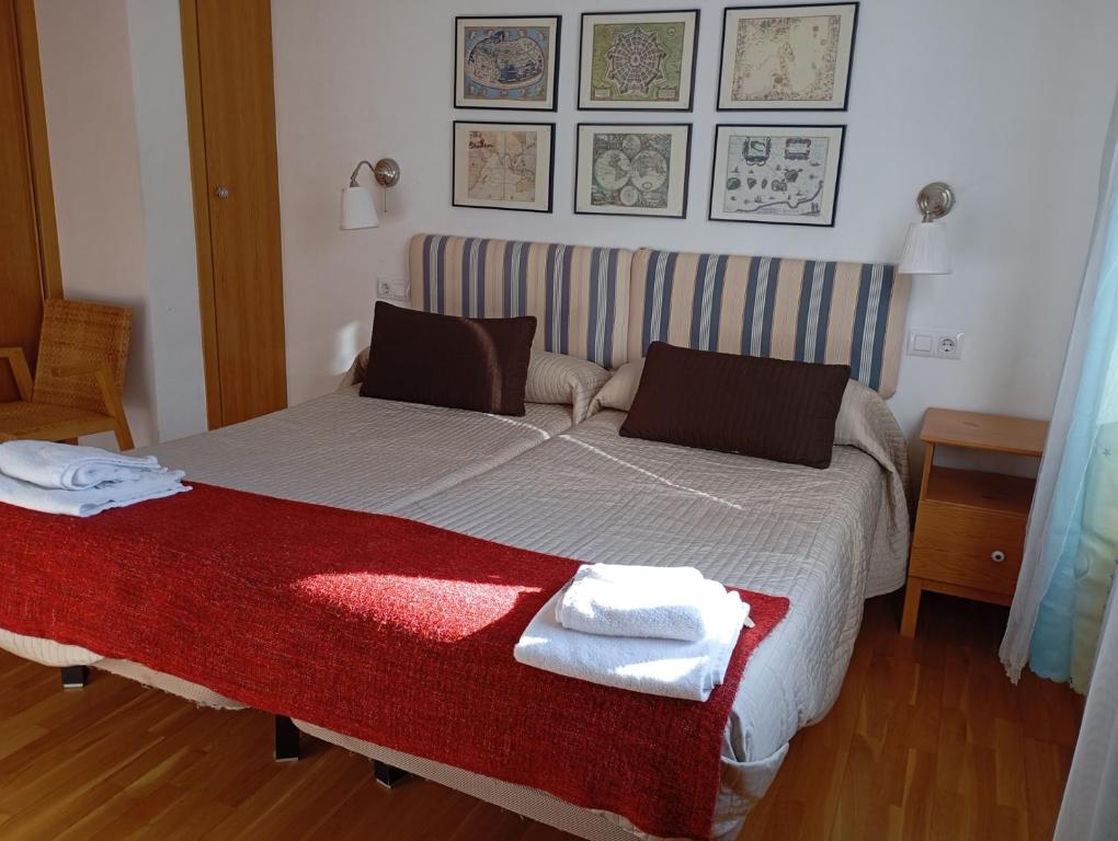 Postel nebo postele na pokoji v ubytování Apartamentos el Camino
