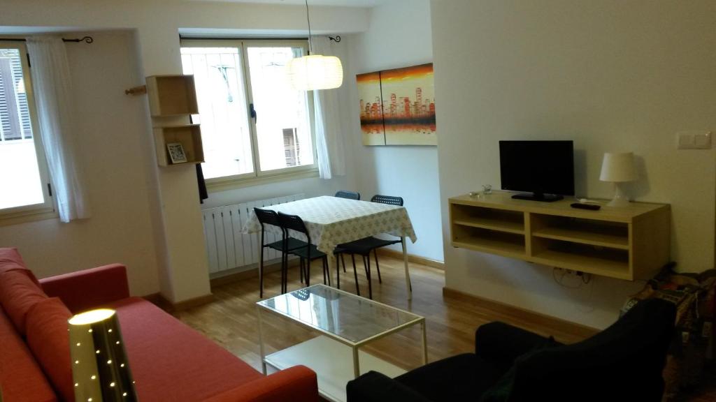 TV a/nebo společenská místnost v ubytování Apartamentos el Camino