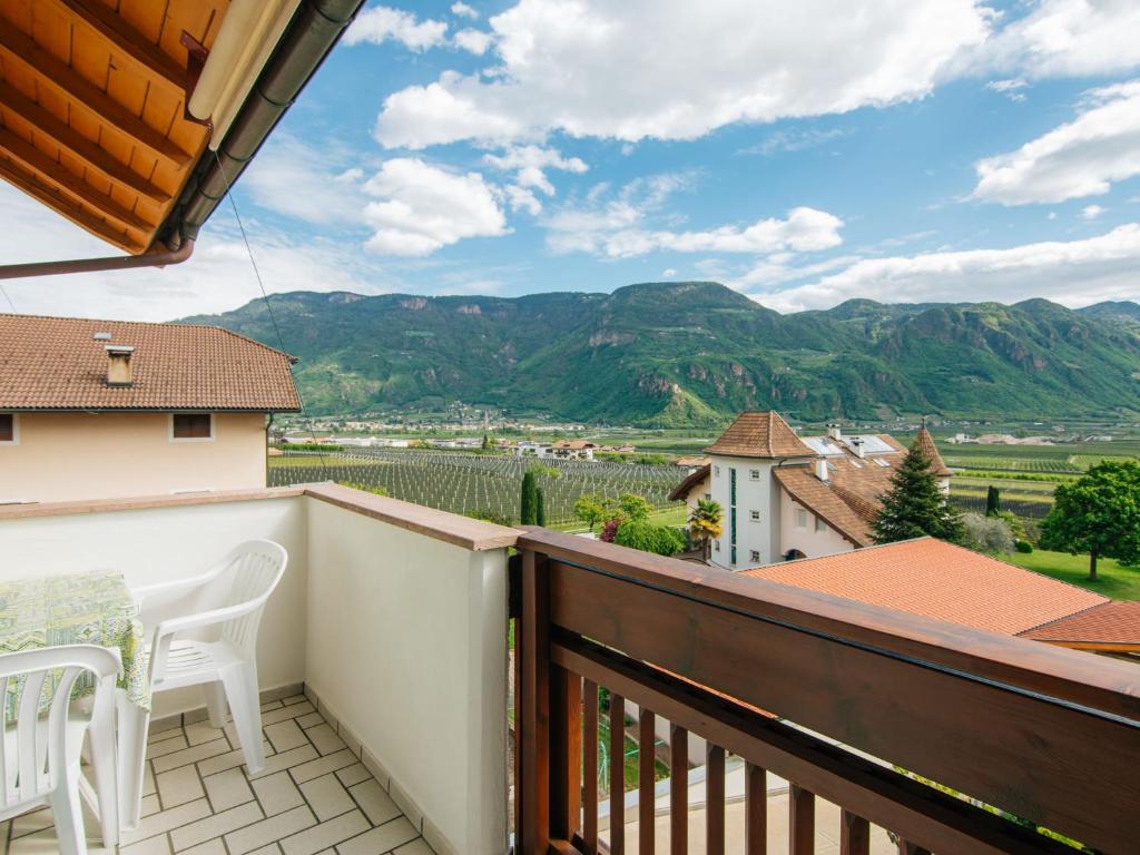 a balcony with a view of the mountains at Apartment Rosengartenhof-1 by Interhome in Andrian