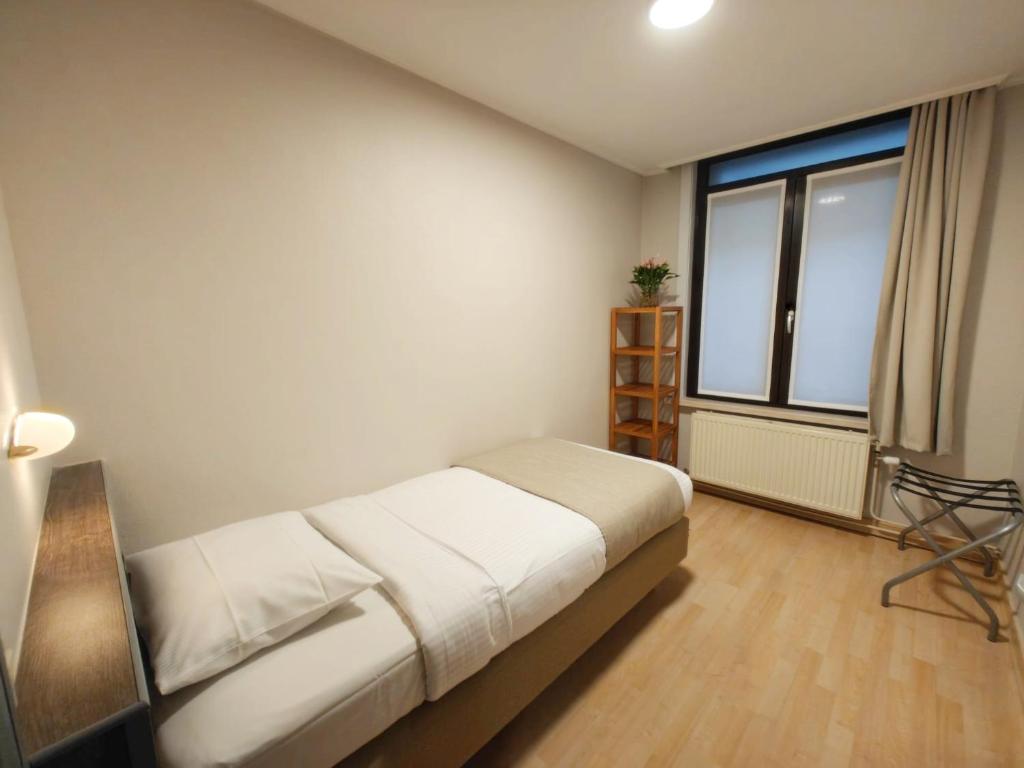 Postel nebo postele na pokoji v ubytování Hotel Tropicana