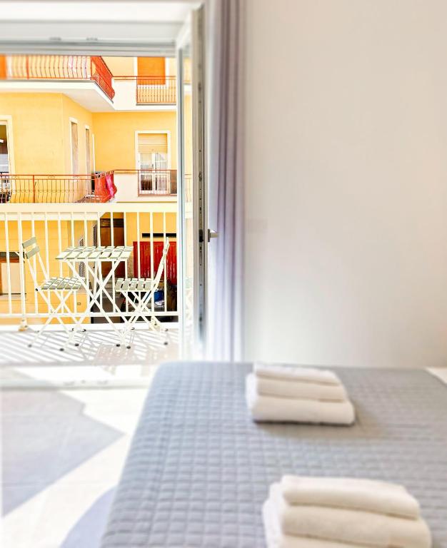 Postel nebo postele na pokoji v ubytování NEMO BnB ALGHERO CENTRE