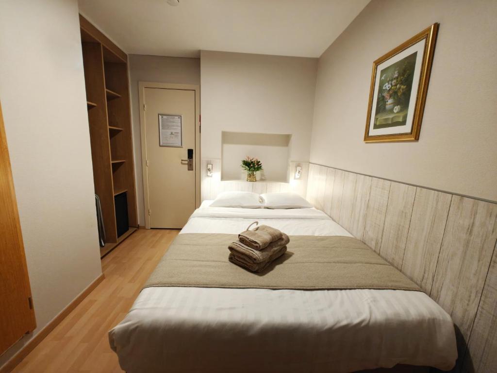 Postel nebo postele na pokoji v ubytování Hotel Tropicana