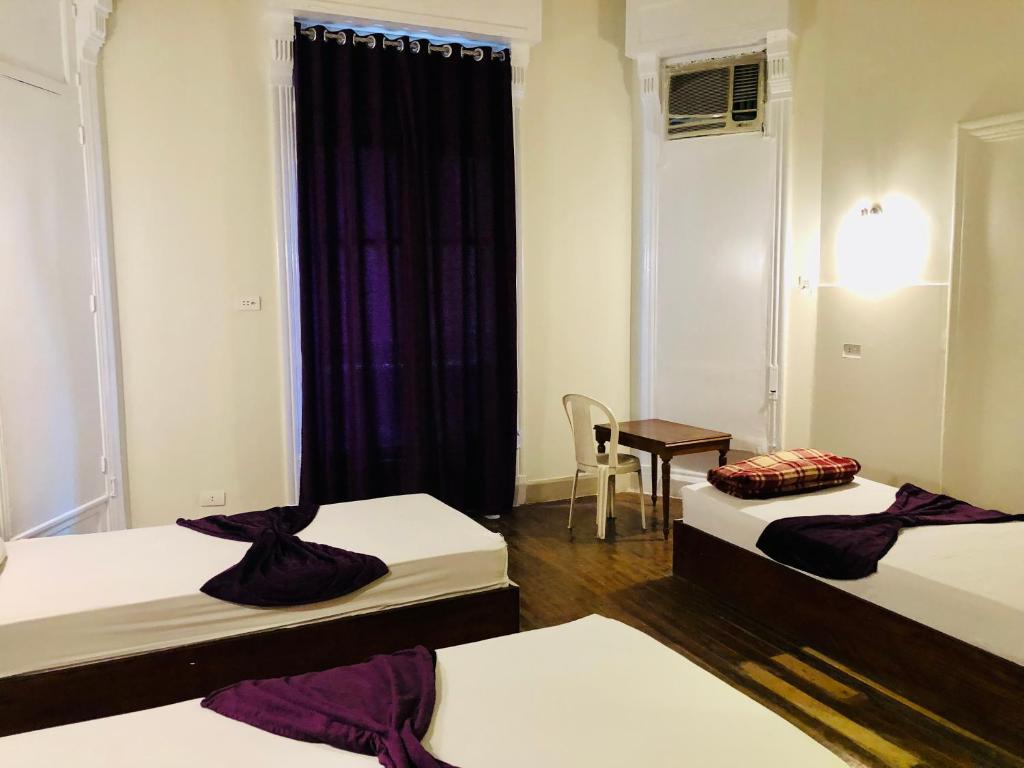 Postel nebo postele na pokoji v ubytování Mesho Cairo Hostel