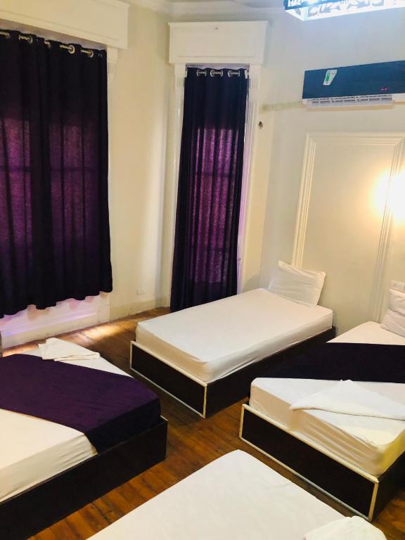 Postel nebo postele na pokoji v ubytování Mesho Cairo Hostel