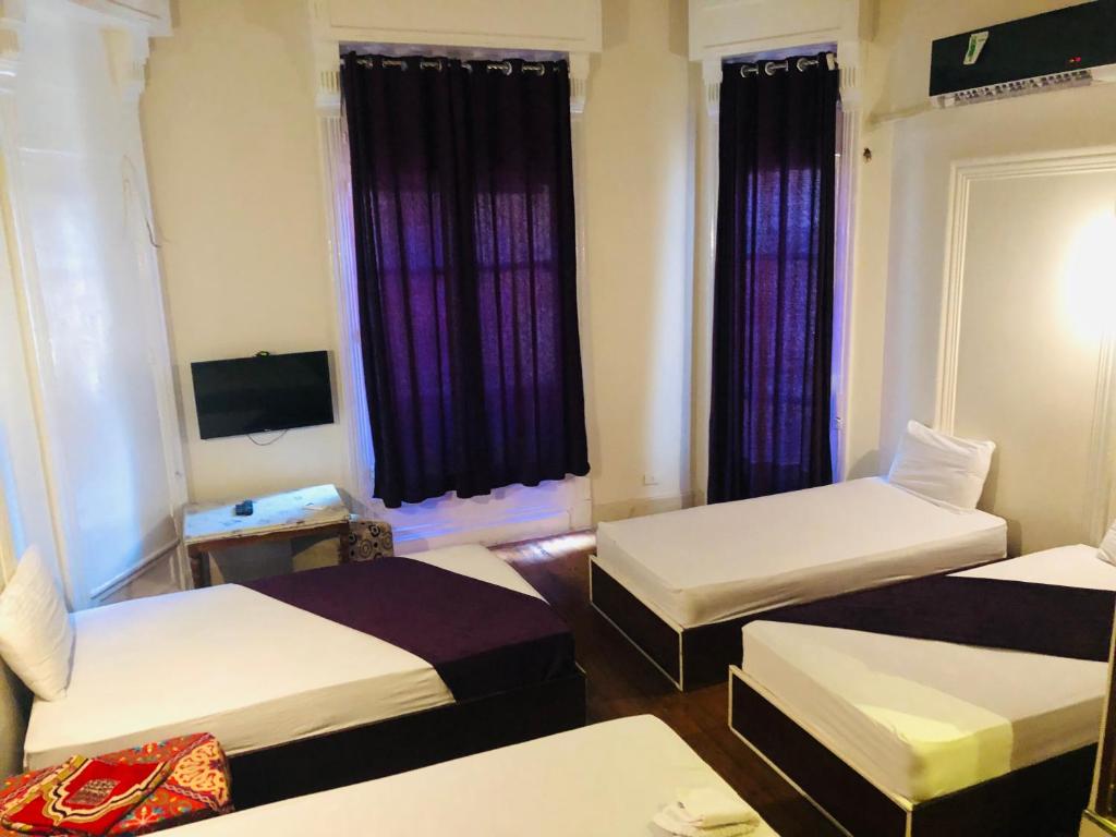 Postel nebo postele na pokoji v ubytování Mesho Cairo Hostel