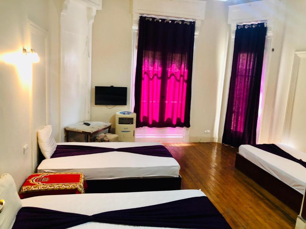 Postel nebo postele na pokoji v ubytování Mesho Cairo Hostel
