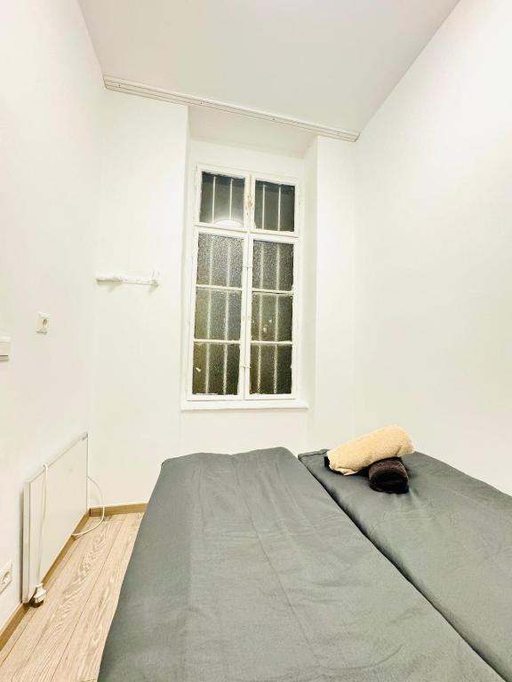 Posteľ alebo postele v izbe v ubytovaní Amazing 2BR Apartment Near Praterstern