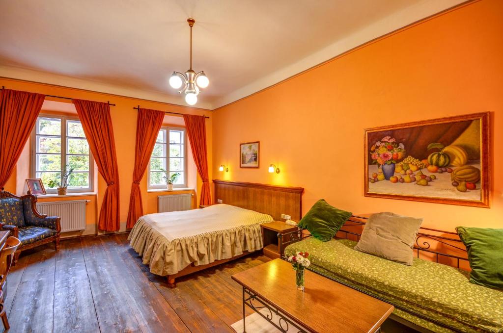 Ένα ή περισσότερα κρεβάτια σε δωμάτιο στο Hotel Edward Kelly
