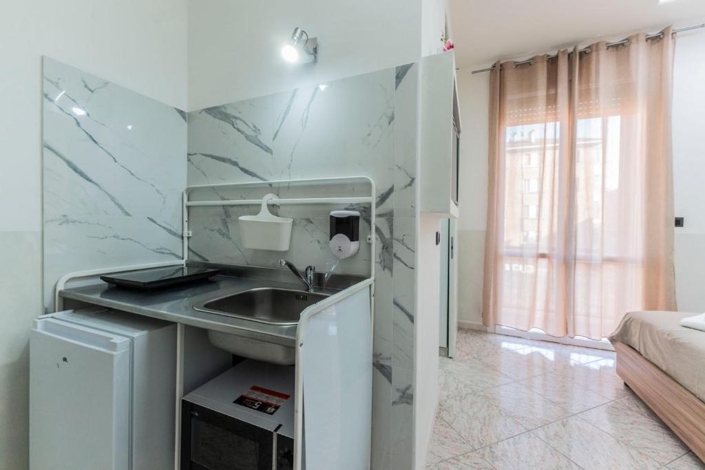 Fioravanti Apartments - San Luca Suite & Genesis House, A pochi passi dalla stazione, vicino al cuore di Bologna - Resim 6