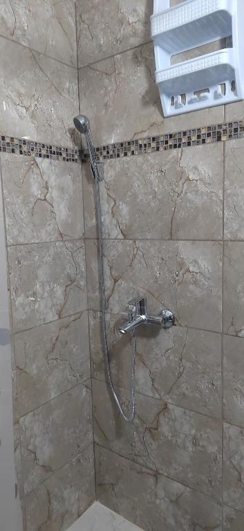 Vannituba majutusasutuses Apartmani Boki