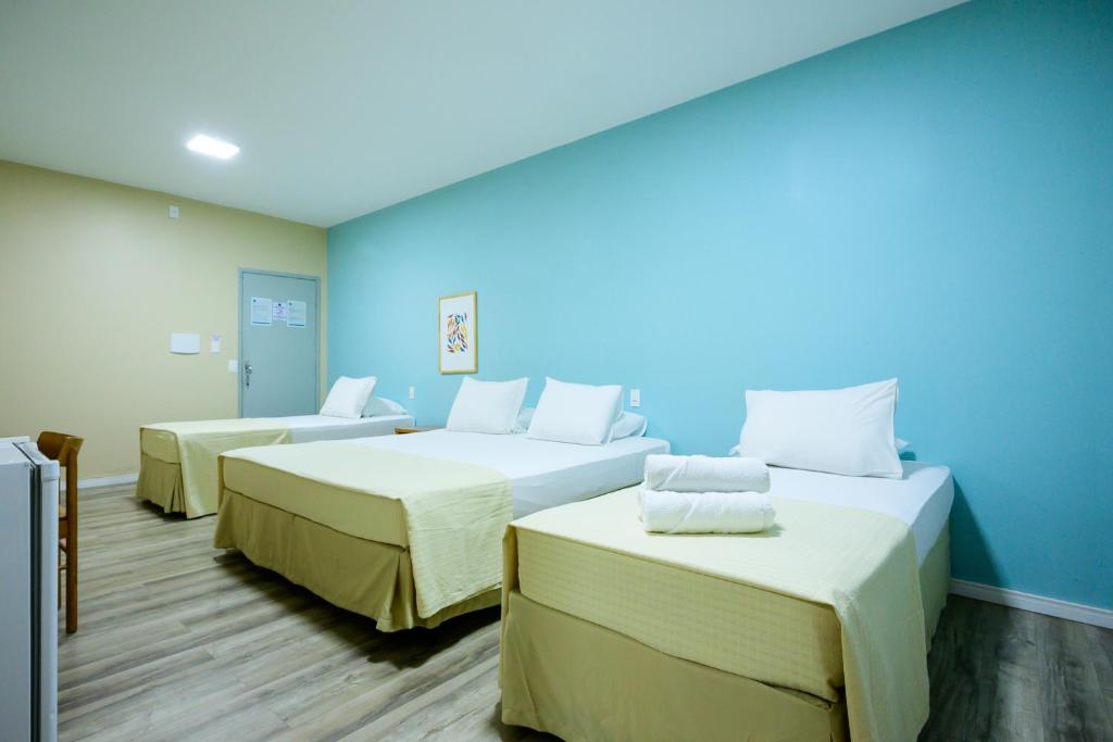 Postel nebo postele na pokoji v ubytování Nordeste Palace Hotel