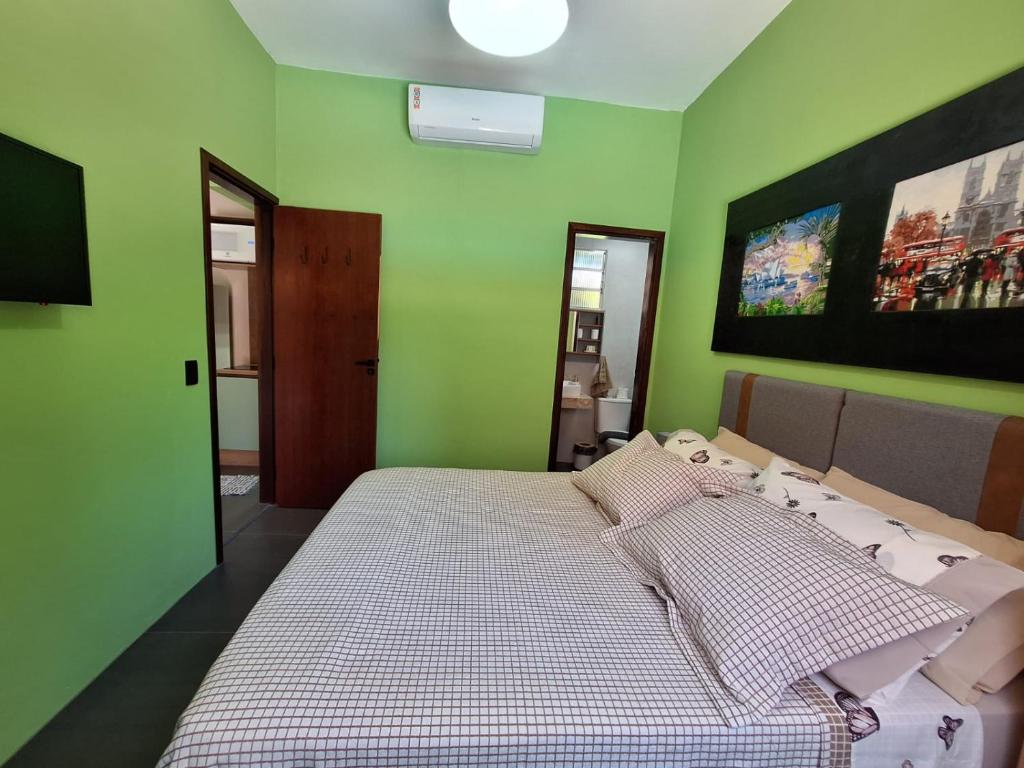 Postel nebo postele na pokoji v ubytování Casa da Farofa