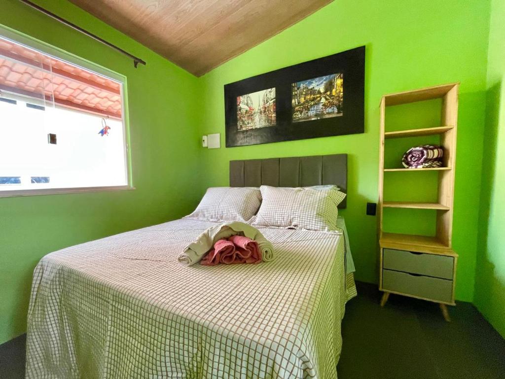 Postel nebo postele na pokoji v ubytování Casa da Farofa
