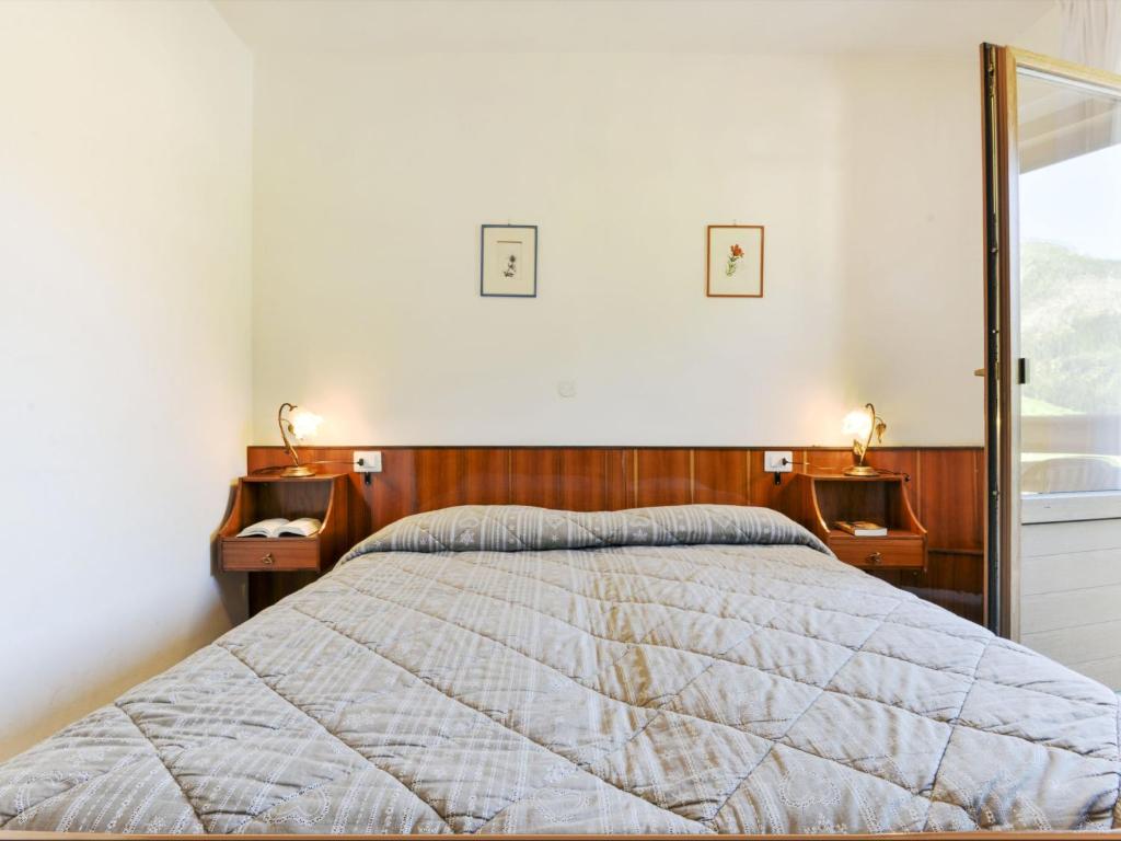 Postel nebo postele na pokoji v ubytování Apartment El Ladinia-1 by Interhome