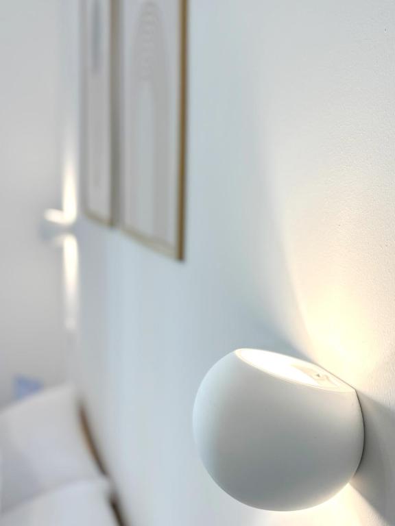 Postel nebo postele na pokoji v ubytování NEMO BnB ALGHERO CENTRE