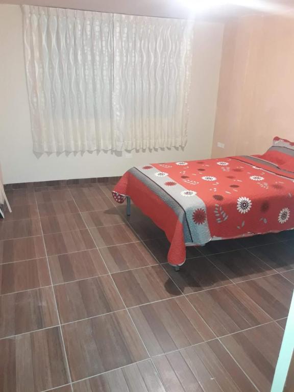 Postel nebo postele na pokoji v ubytování La Posada