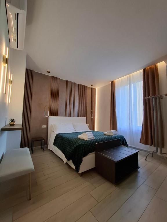 Postel nebo postele na pokoji v ubytování Suite House 5 Terre