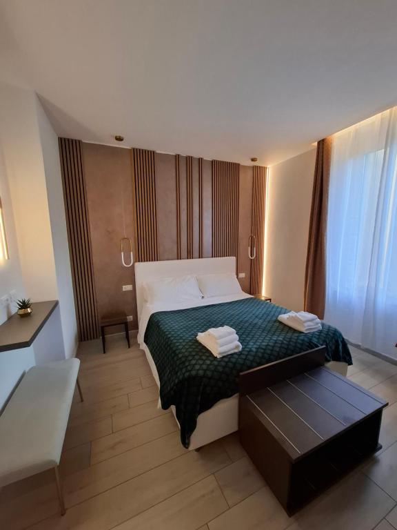 Postel nebo postele na pokoji v ubytování Suite House 5 Terre