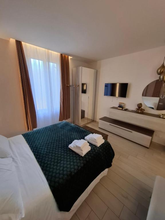 Postel nebo postele na pokoji v ubytování Suite House 5 Terre