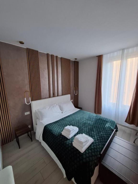 Postel nebo postele na pokoji v ubytování Suite House 5 Terre