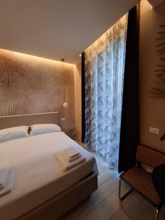 Postel nebo postele na pokoji v ubytování Suite House 5 Terre